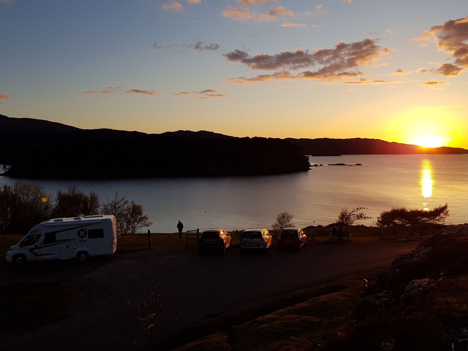 Wild camp spot with the sunset by the loch