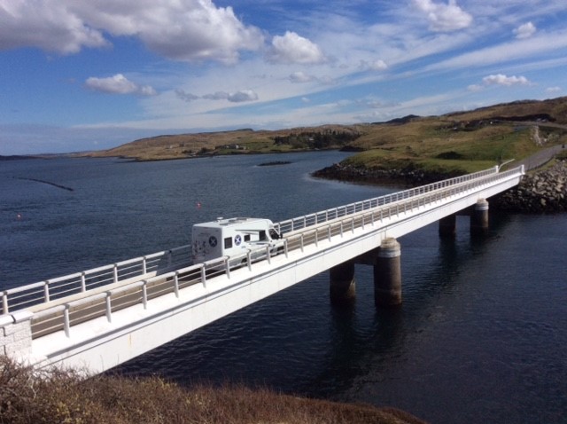 Scottish tourer motorohme crossing bridge on Lewis