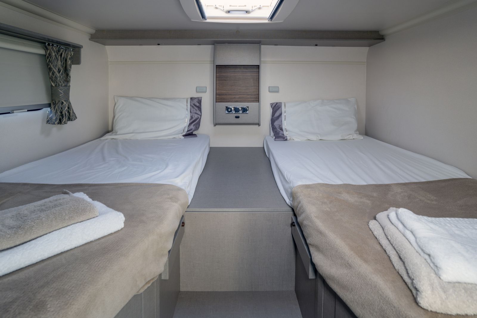 two single beds in the lewis campervan