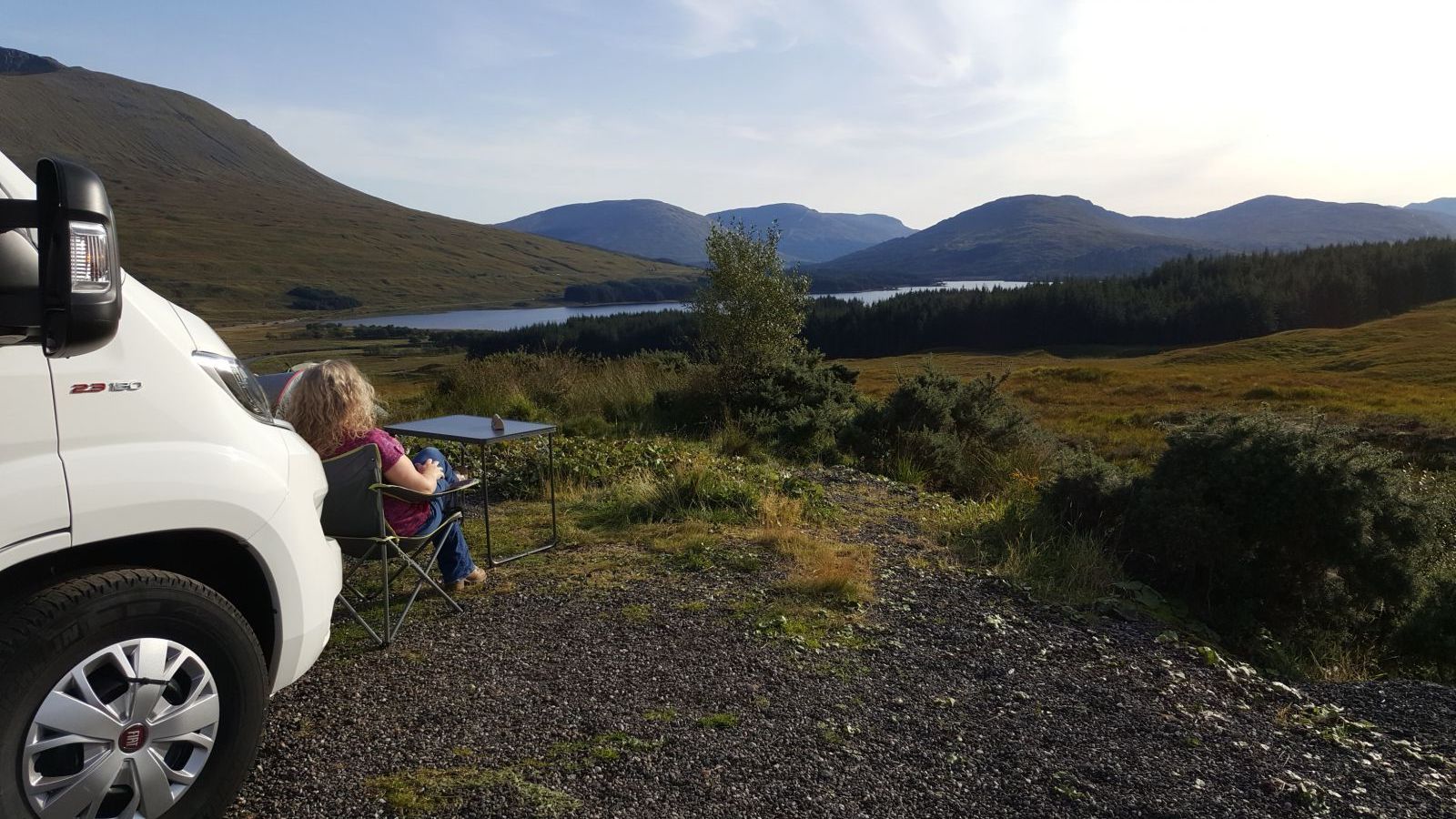 Motorhome parked at lochside