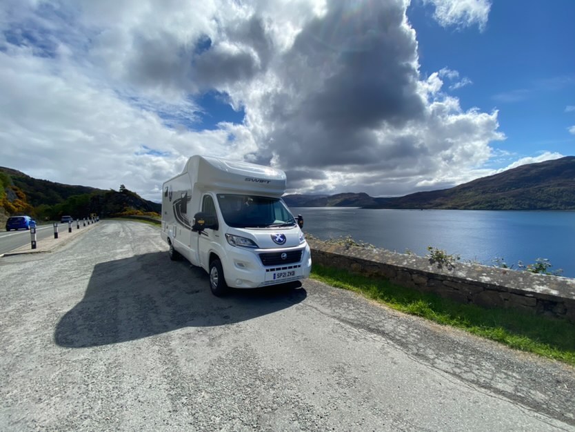 Scottish tourer motorhome parked by the Loch