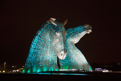 The Kelpies lit up at night