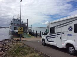 Scottish tourer motorhome at the ferry on the outer hebridies