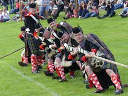 Tug of war at Highland games/ Scotish tourer motorohme hire