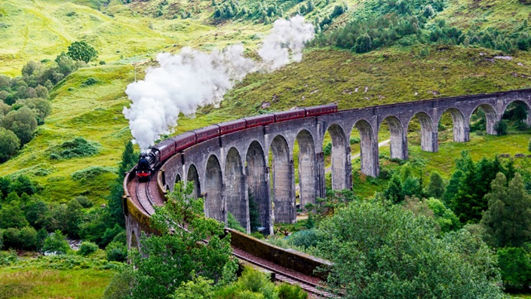 Steam Train passing over Glenfinnan Viaduct 