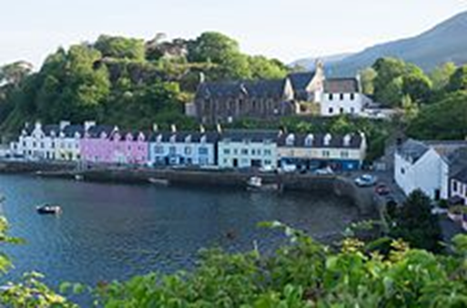 picture of coloured houses by the water