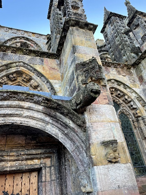 Exterior of Rosslyn Chapel gargoyle protecting the door