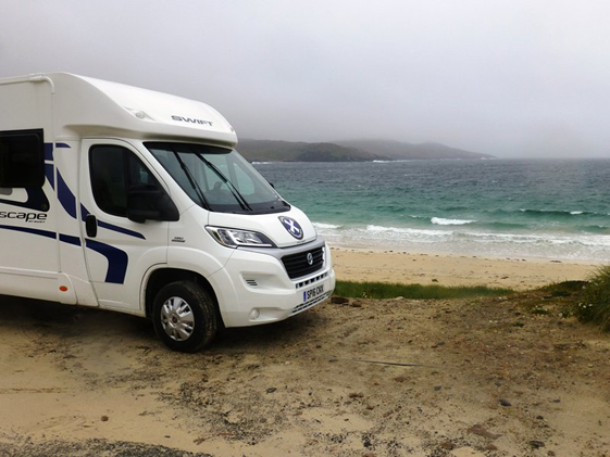 Motorhome parked by the beach