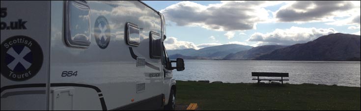 Scottish Tourer parked up by the loch side