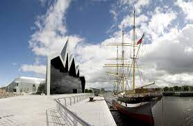 Riverside Museum building in Glasgow with boat at the front
