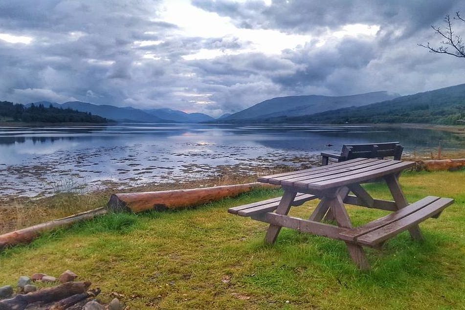 Loch side photo with bench