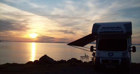 Motorhome parked and a sunset view