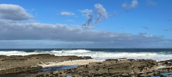 waves crashing into the rock