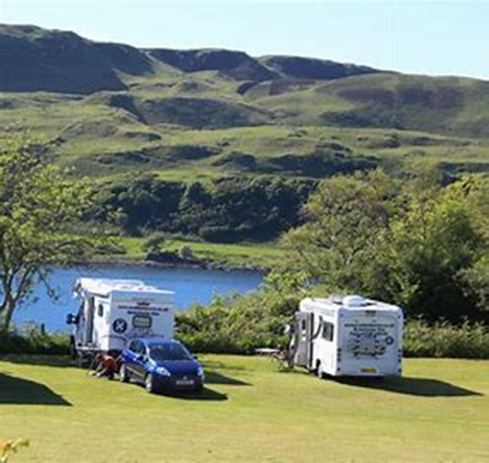 Motorhome parked by loch