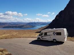 Scottish tourer motorhome parked by the sea